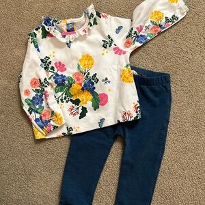 Adorable 9-12m Joules girls outfit. Floral tip matches ruffled blue pants.